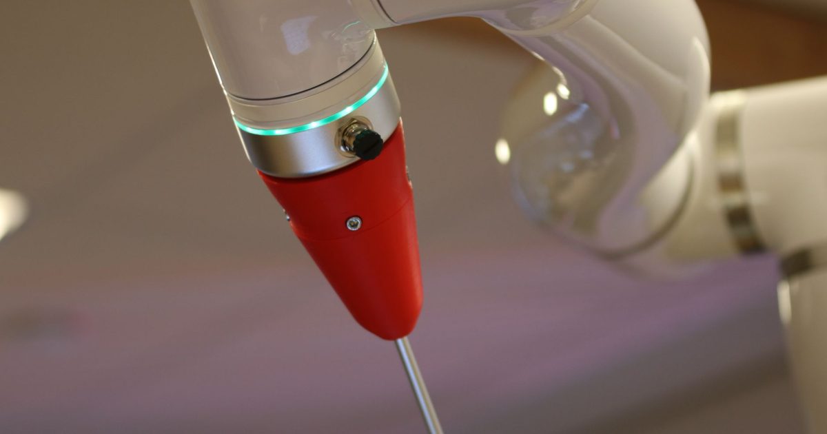Detailed view of a cutting-edge industrial robotic arm in action.
